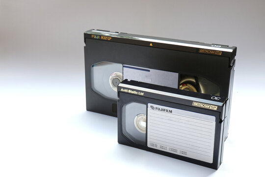 A large and a small Betacam SP (or Beta SP) Tape which were used for professional Video Recording in Standard Definition in Broadcast. The big one captures up to 60 minutes, the small one 30 minutes.