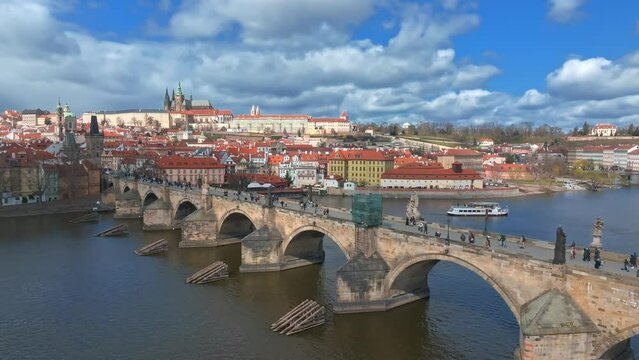 Scenic spring panoramic aerial view of the Old Town pier architecture and Charles Bridge over Vltava river in Prague, Czech Republic