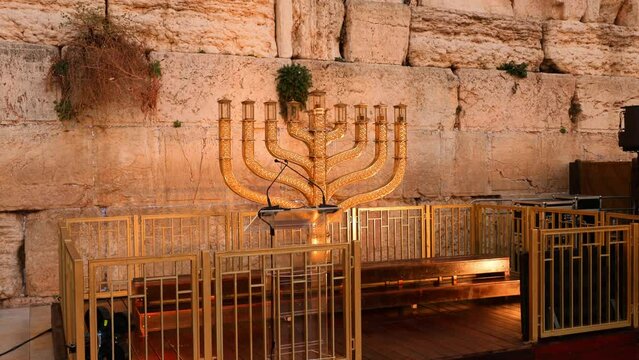 Hanukkah at the wailing wall in the old city of Jerusalem in Israel, panorama to the top