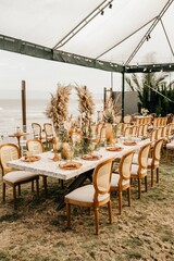 View of wooden chairs and decorations on a wedding day at outdoor hall