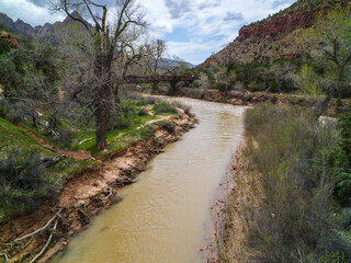Zion National Park in Utah with snow melt water in Virgin river 