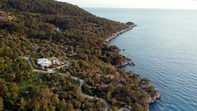 A drone view of the southern coast of Turkey. Faralya region. Arriving to Actas beach.