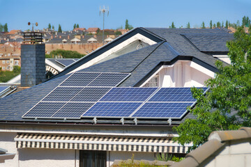 Houses with solar panels on the roof.