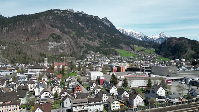 
alpine town of bludenz in austria, aerial view, beautiful landscape, railway, highway, transmission line