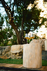 Woven rattan basket pendants cluster under a black ceiling, adding eco-chic warmth to the caf&eacute; interior.