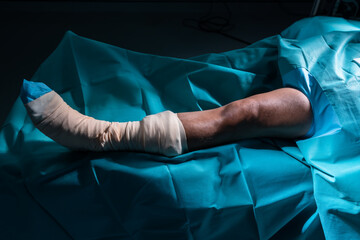 Close-up leg with knee machine problem undergoes knee surgery,  right leg is straightened on...