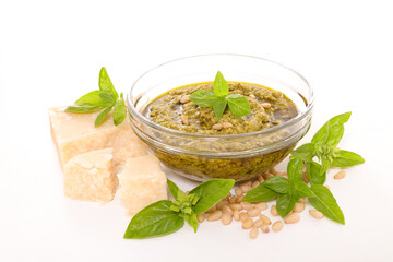 pesto sauce and fresh ingredients isolated on white background