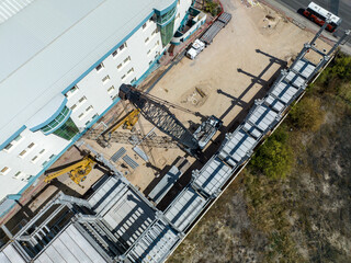 Construction crane is seen from a drone
