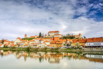 Panorama cityscape view at Ptuj and the river Drava in April, early spring. Ptuj is the oldest town...