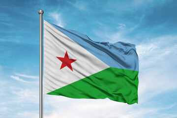 Djibouti national flag cloth fabric waving on beautiful sky Background.