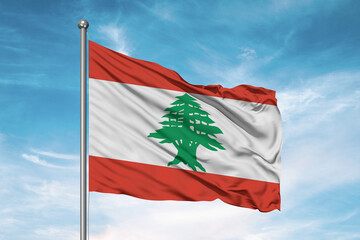 Naklejka na ściany i meble Lebanon national flag cloth fabric waving on beautiful sky Background.