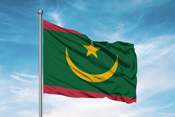 Mauritania national flag cloth fabric waving on beautiful sky Background.