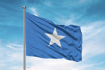 Somalia national flag cloth fabric waving on beautiful sky Background.