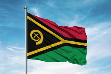 Vanuatu national flag cloth fabric waving on beautiful sky Background.