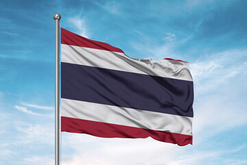 Fototapeta na wymiar Thailand national flag cloth fabric waving on beautiful sky Background.