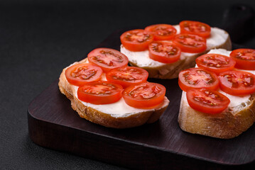 Delicious crispy grilled toast with cheese and cherry tomatoes