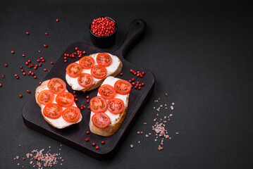Delicious crispy grilled toast with cheese and cherry tomatoes