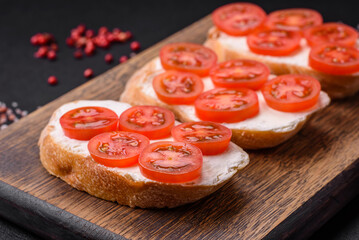 Delicious crispy grilled toast with cheese and cherry tomatoes