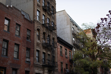 Fototapeta na wymiar Row of Old Residential Buildings during the Evening in Greenwich Village of New York City