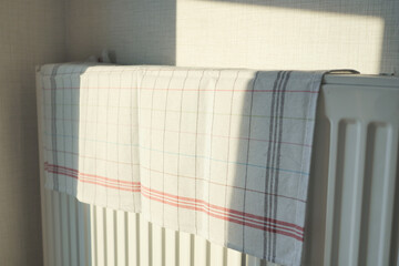 drying a towel on heating radiator,