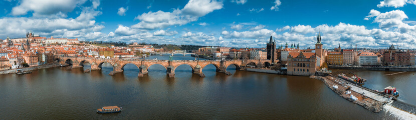 Scenic spring panoramic aerial view of the Old Town pier architecture and Charles Bridge over Vltava river in Prague, Czech Republic