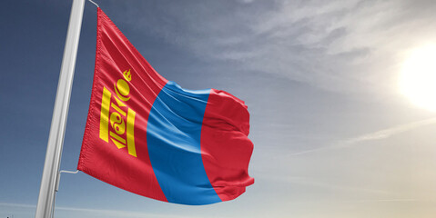 Mongolia national flag cloth fabric waving on beautiful sky grey Background.