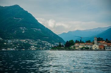 Lake Como with Alps mountains and the city of Como in background