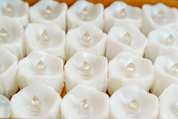 close-up. box with small white electronic candles.