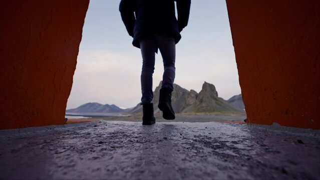 Ground Level Shot Of A Man Leaving Hvalnes Lighthouse