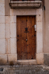 An ancient house doors in old town, Spain