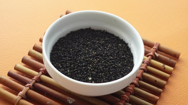 Black Cumin seed in a bowl on table 