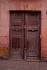 An ancient house doors in old town, Spain