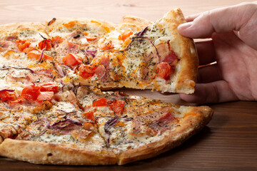 Carbonara pizza on a white background. Pizza making. Pizza sales.