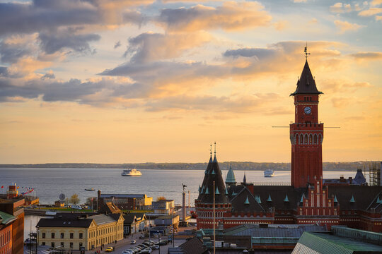 The Town hall is the main landmark of Helsingborg, Sweden. The historical Town Hall was built in neo-Gothic style in 1897. Helsingor, Denmark in the background.