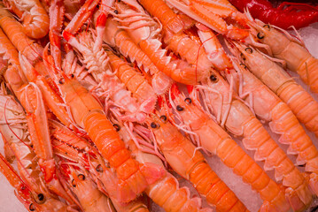 Background of fresh cooked prawns for sale at a market