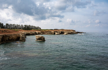 The rocks and sea caves at the coast of Peyia, Cyprus