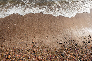 Sea pebbles. Small stones gravel texture background.