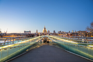 Millennium bridge and dome of St. Paul's cathedral in London. England