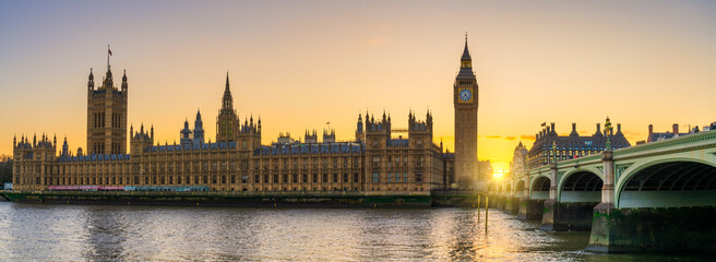 Big Ben and Westminster panorama at sunset in London. England