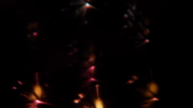 Blurry Gold And Pink Lights From Burning Sparklers