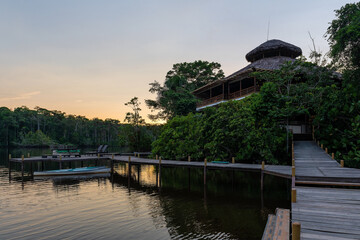 Amazon rainforest hotel lodge at sunset, Yasuni national park, Ecuador.