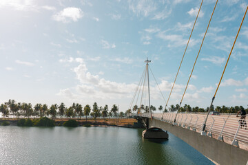Cable bridge over the river, with access to the beach