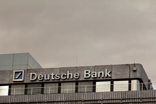 DUISBURG, GERMANY - NOVEMBER 11, 2022: Selective blur on a deutsche bank logo on their office for Duisburg. Deutsche bank is a germany bank specialized in investment and financial services.