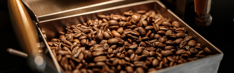 Industrial coffee roasting machine with brown coffee beans