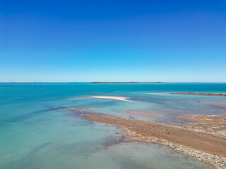 Aerial over the ocean and reed