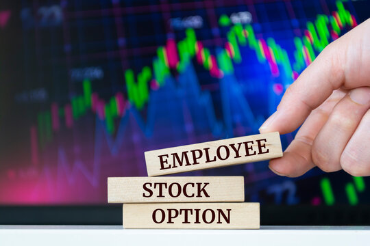 Wooden blocks with words 'Employee Stock Option'. Business concept