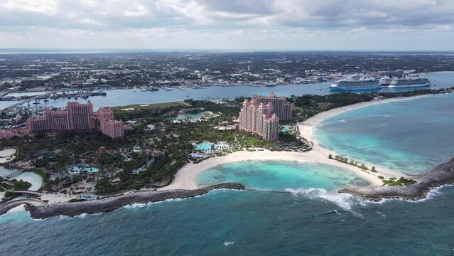 Beautiful cinematic aerial view of the Bahamas Beautiful cinematic aerial view of the Bahamas beaches with turquoise water ocean and people walking and enjoying the sand