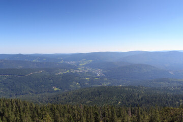 Panorama view of Bavarian Forest and village Bayerisch Eisenstein seen from mountain Großer Arber, Germany