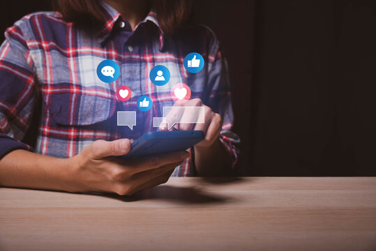 Social media and digital online concept, woman using smart phone. The concept of living on vacation and playing social media. Social Distancing ,Working From Home concept