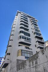 Obraz na płótnie Canvas Low angle view of modern condo building in Armacao de Pera